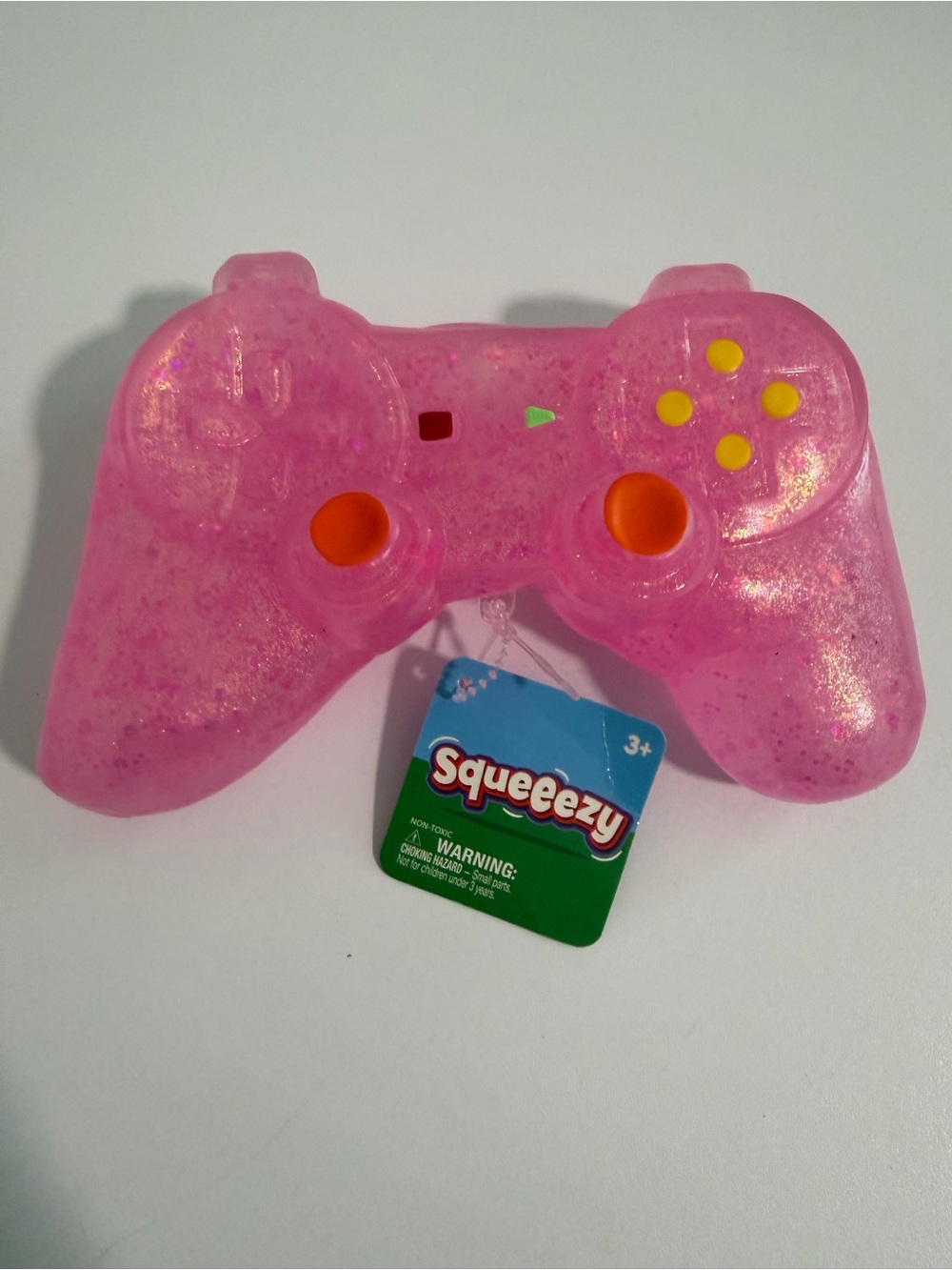 Squeeezy squishy game controller by Toymendous New pink fidget toy